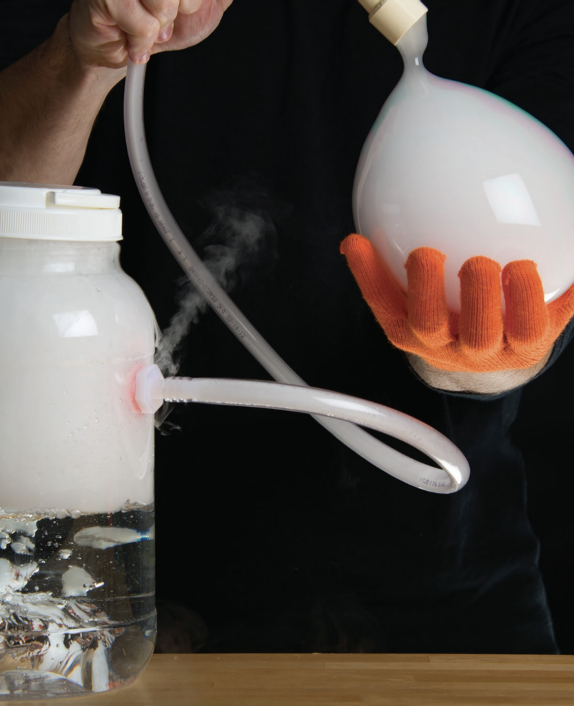 Dry ice vaporising print by Science Photo Library