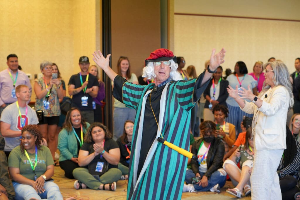 Eddie Goldstein dressed as Galileo demonstrating the effect of gravity for Science in the Rockies participants